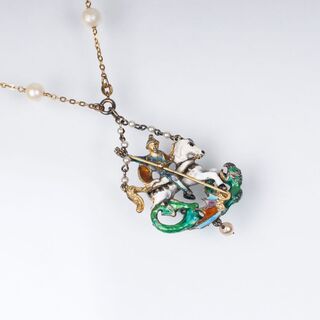 A Pendant 'Saint George with Dragon' on golden necklace