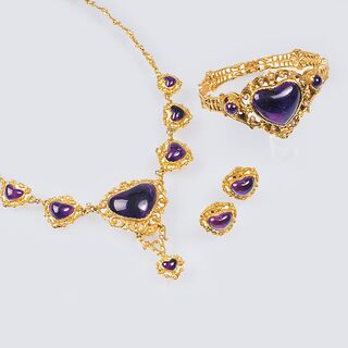 An Amethyst Hear Jewellery Set: Necklace, Earclips and Bangle Bracelet