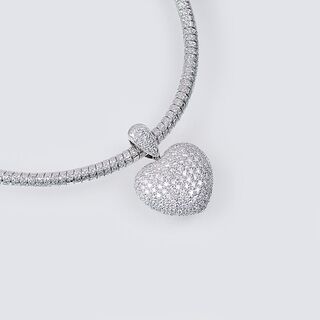 A Heart Shaped Diamond Pendant on Necklace