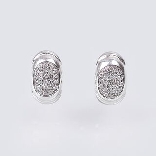 A Pair of Diamond Earrings