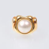 A Two Coloured Gold Ring with Mabé Pearl - image 1