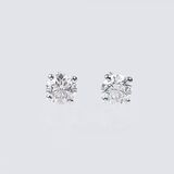 A Pair of Rare-White Solitaire Diamond Earrings