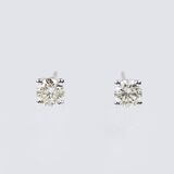 A Pair of Solitaire Diamond Earrings - image 1