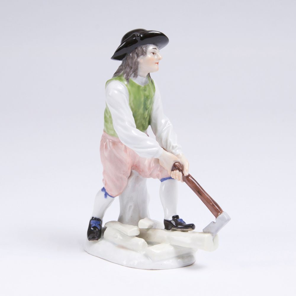 A Figure of a Wood Splitting Craftsman with Ax