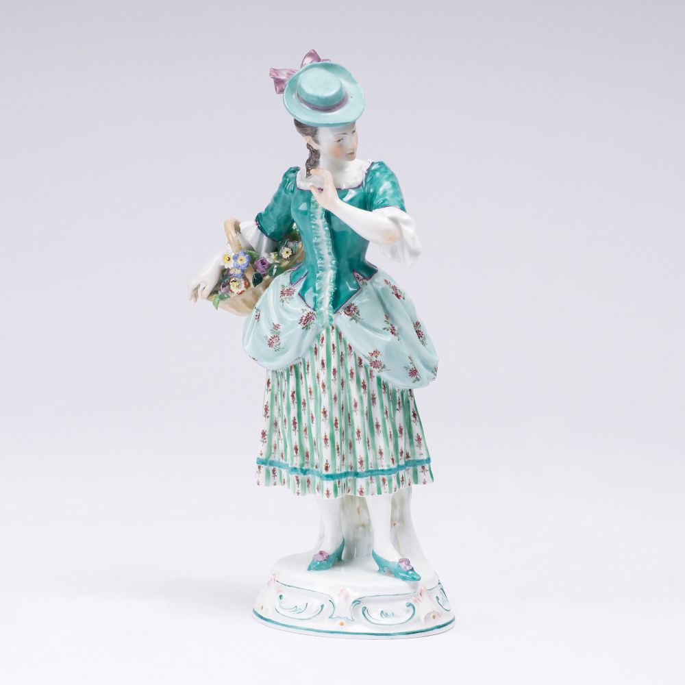 A rare Figure 'Lady with Flower Basket'