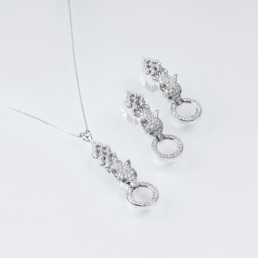 A Pair of Diamond Emerald Earrings 'Panther' with matching Pendant on Necklace