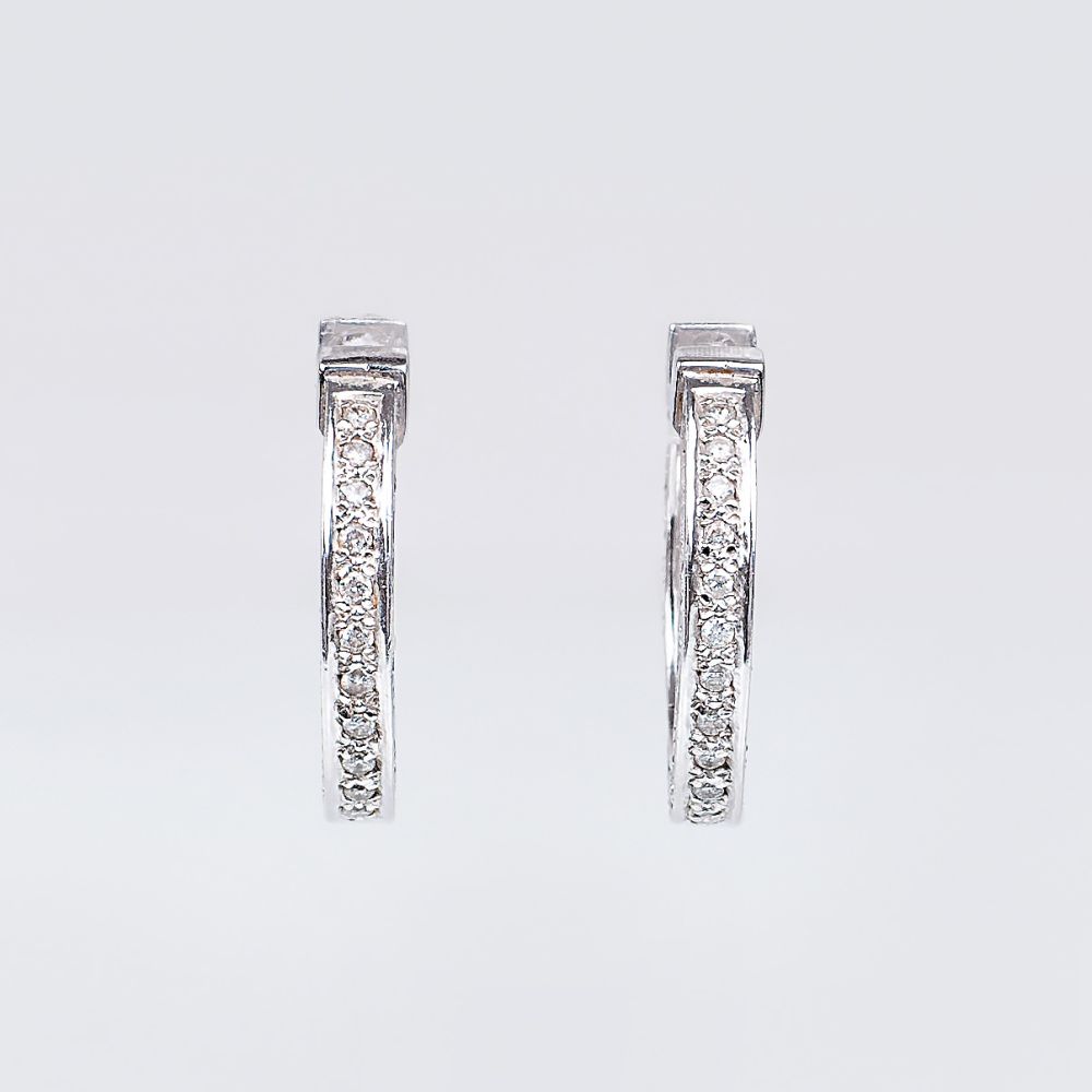 A Pair of Diamond Earrings