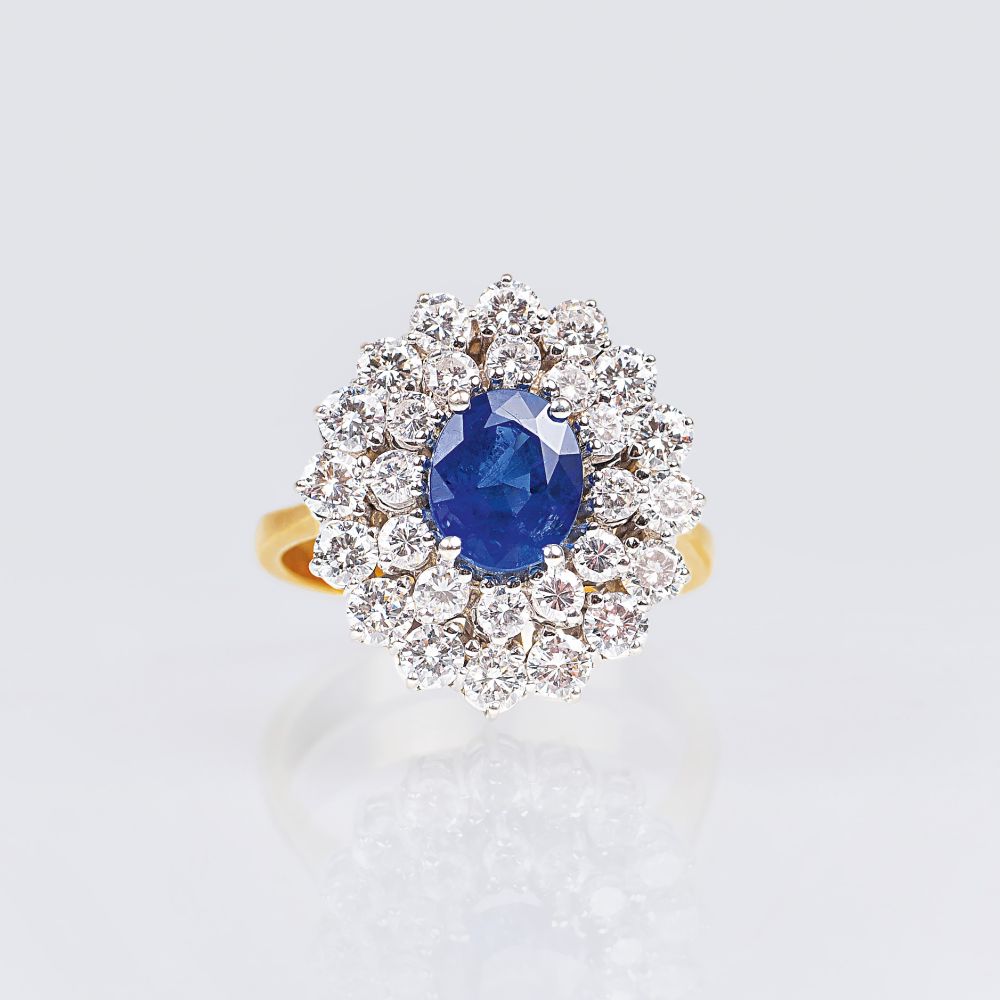 A very fine Diamond Ring with natural Sapphire