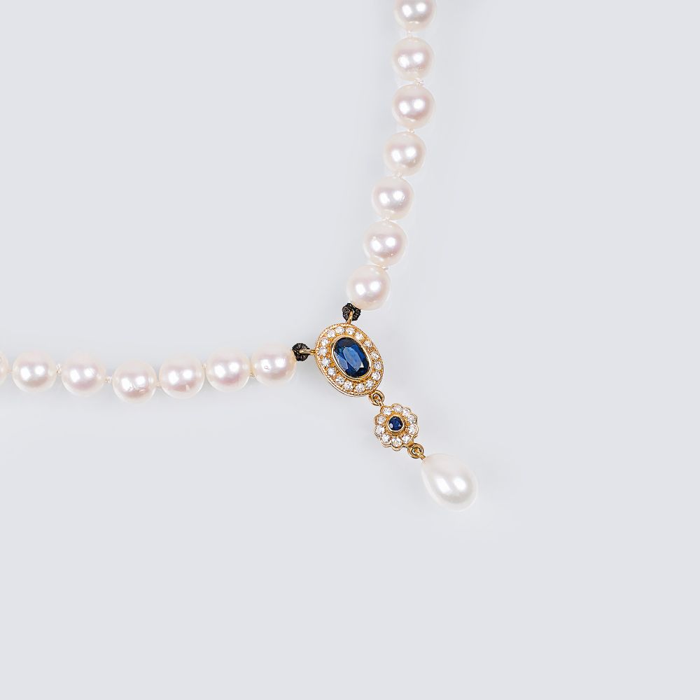 A Pearl Necklace with Sapphire Diamond Pendant