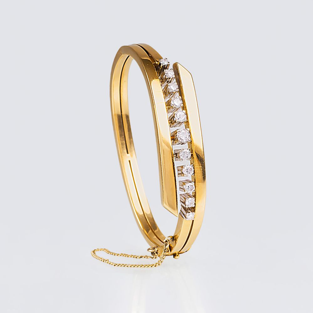 A Gold Bangle Bracelet with Diamonds