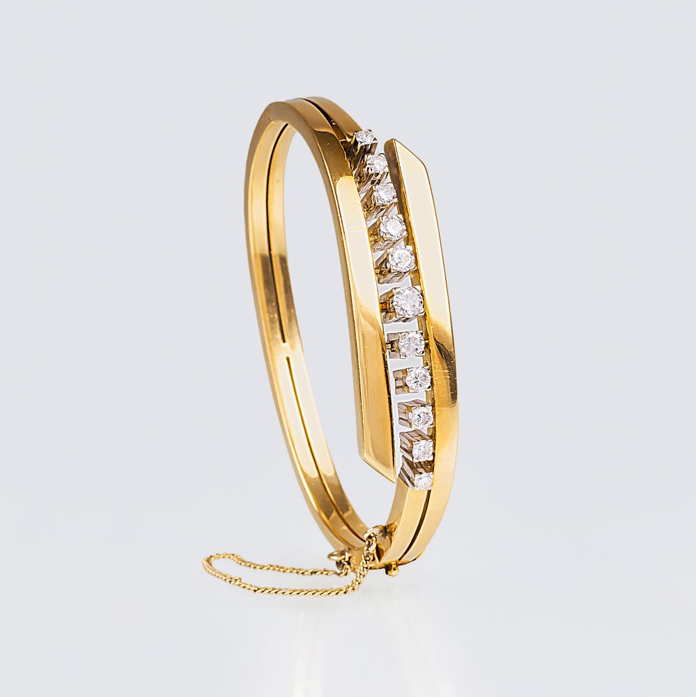 A Gold Bangle Bracelet with Diamonds A Gold Bangle Bracelet with Diamonds