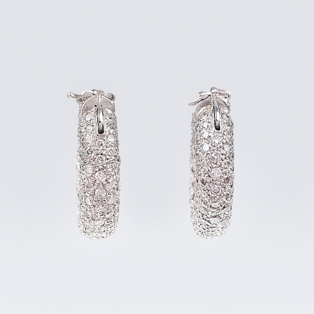 A Pair of Diamond Earrings