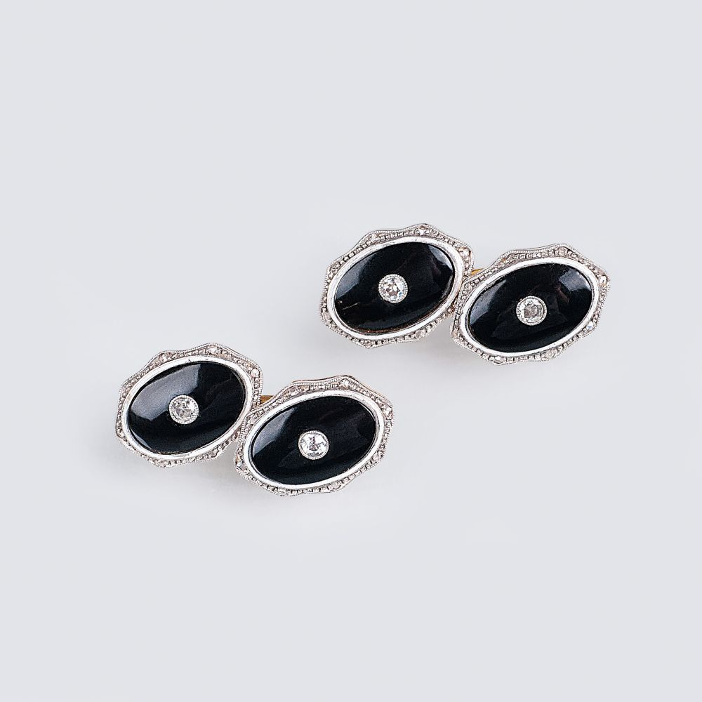 A Pair of Art Nouveau Cufflinks with Onyx and Diamonds