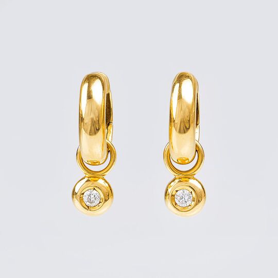A Pair of Earrings with small Diamond Pendants