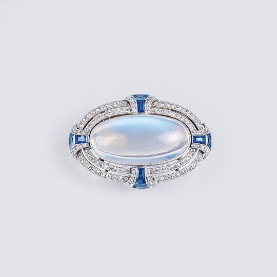 An Art-déco Moonstone Sapphire Diamond Brooch