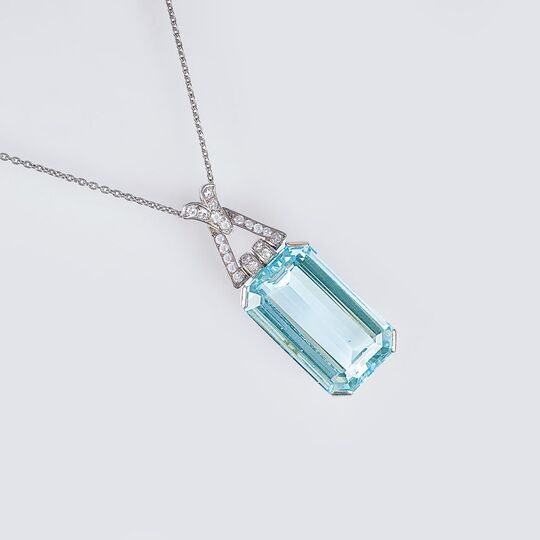 An Art-déco Aquamarine Diamond Pendant on Necklace