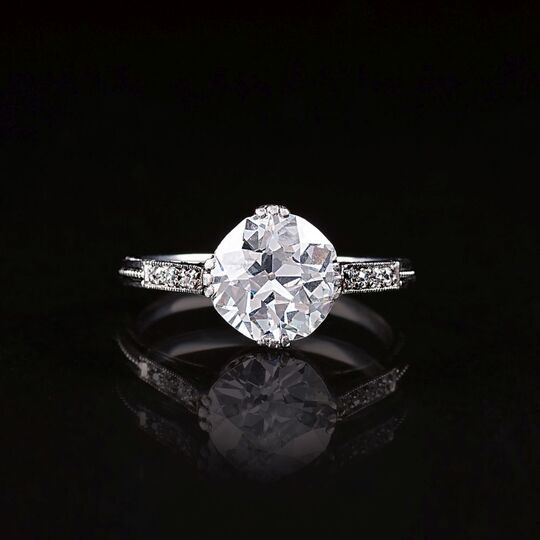 An Art Nouveau Solitaire Diamond Ring