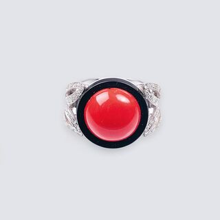 A Ring with Coral, Onyx and Diamonds