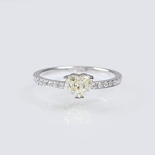 - A Solitaire Ring with Heart shaped Diamond and small diamonds A Solitaire Ring with Heart shaped Diamond and small diamonds