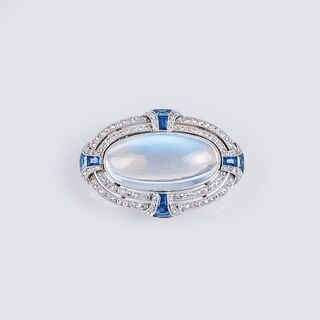 An Art-déco Moonstone Sapphire Diamond Brooch