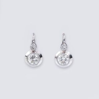 A Pair of Diamond Earrings