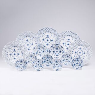 A Royal Copenhagen Set 'Musselmalet Full Lace' of 18 Plates