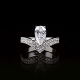 A White Pear-Cut Diamond Ring with Diamonds - image 1