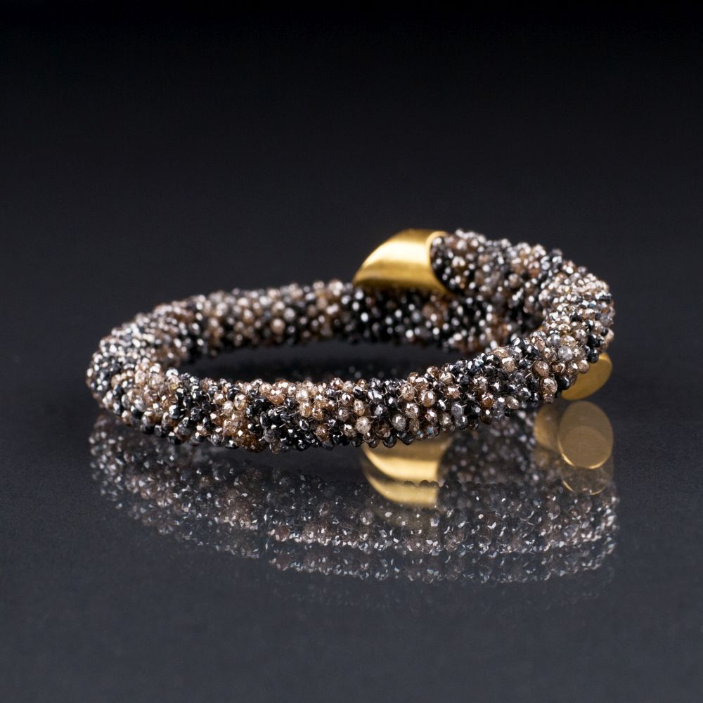 A Diamond Cuff Bangle with Gold Applications