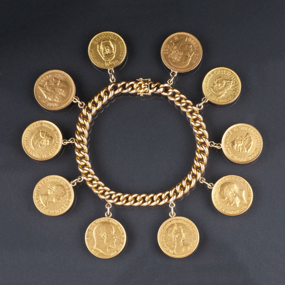 A heavy Gold Bracelet with 10 Coin Pendants A heavy Gold Bracelet with 10 Coin Pendants