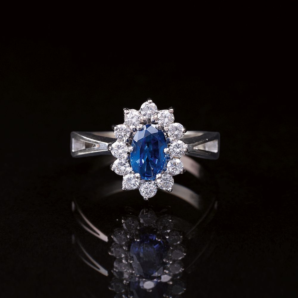 A petite Sapphire Diamond Ring A petite Sapphire Diamond Ring