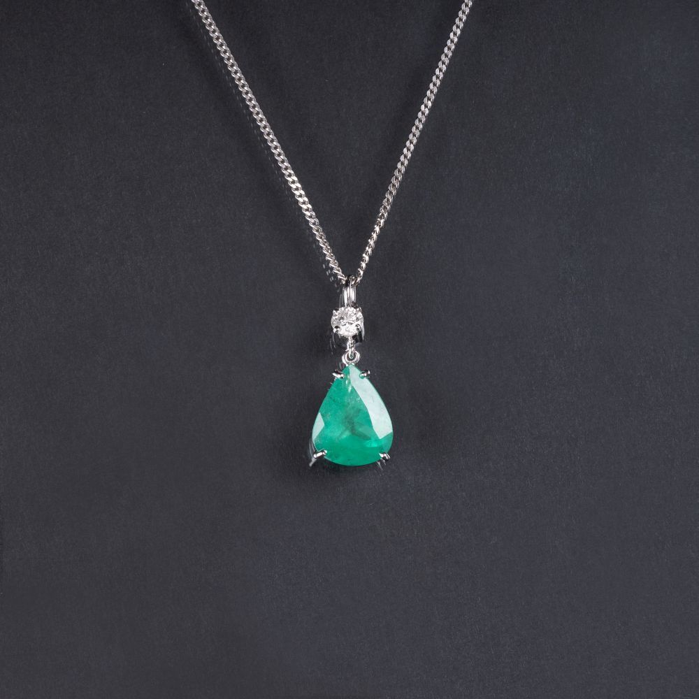 An Emerald Pendant with Solitaire Diamond on Necklace