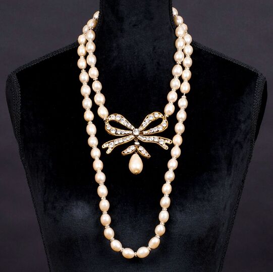 A Gossens Faux Pearl Necklace with Strass Set Ribbon