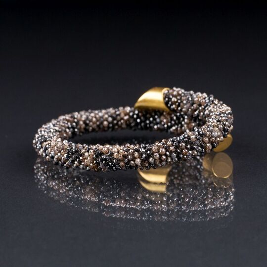 Diamant-Armspange mit Gold-Applikation