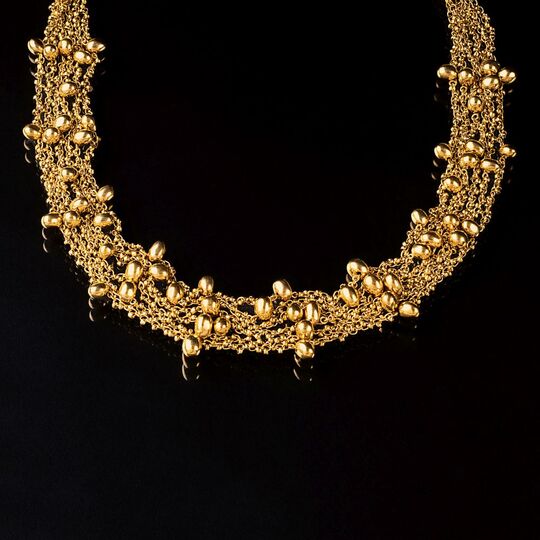 Susanna Dünne: A multiple row Gold Necklace