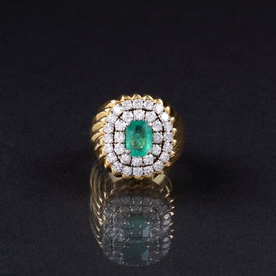 A large Emerald Diamond Ring