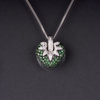 A Necklace with heartshaped Tsavorithe Diamond Pendant