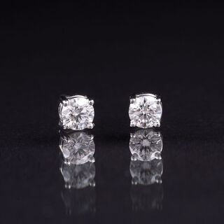 A Pair of Rare-White Solitaire Earstuds
