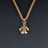 A Gold Necklace with Diamond Pendant 'Jumping Jack' with Crown - image 1