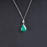 An Emerald Pendant with Solitaire Diamond on Necklace