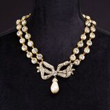 A Two-Row Collier with Bow and Faux Pearl - image 1