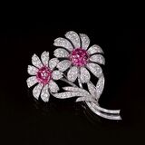 A Highcarat Diamond Ruby Flower Brooch