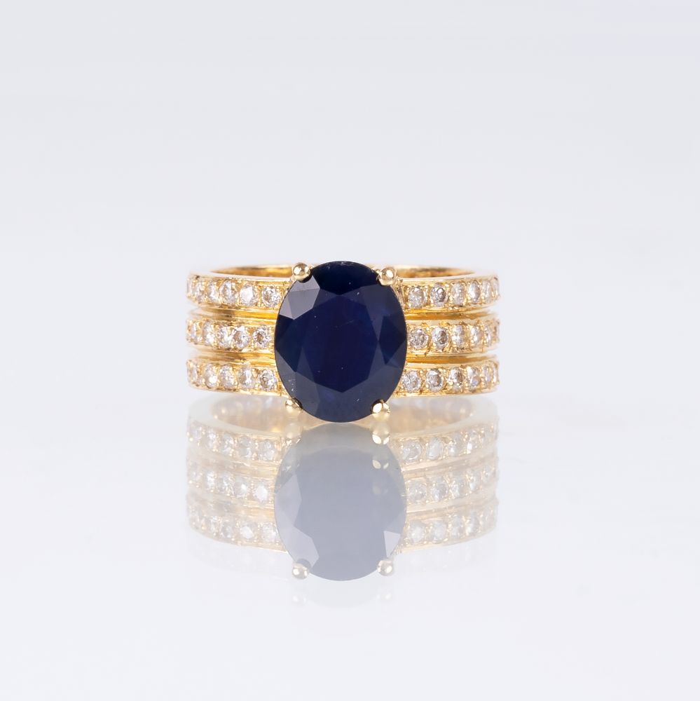 A Sapphire Diamond Ring A Sapphire Diamond Ring