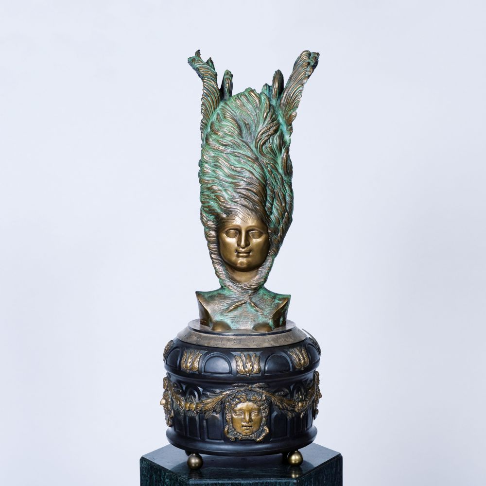 Ernst Fuchs - A Limited Bronze Clock 'Janus' with Movement by IWC A Limited Bronze Clock 'Janus' with Movement by IWC