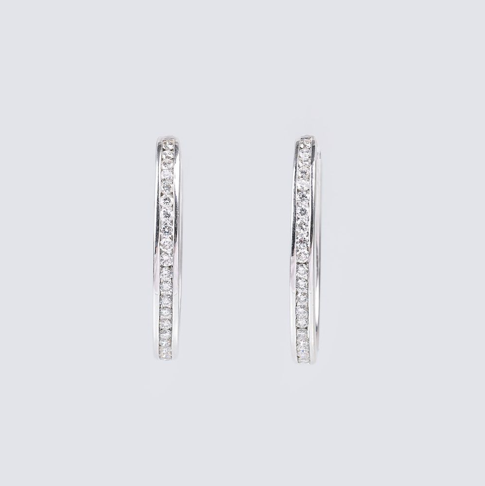 A Pair of Diamond Earrings