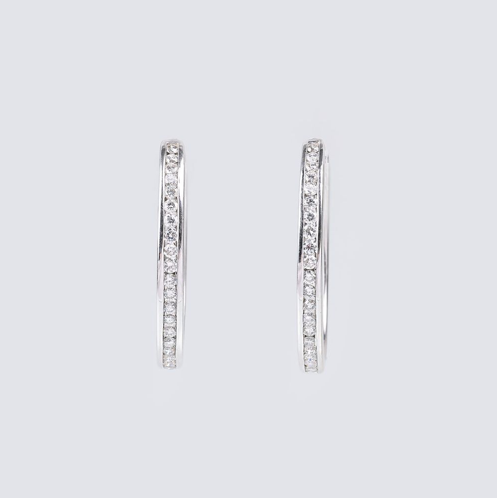 A Pair of Diamond Earrings