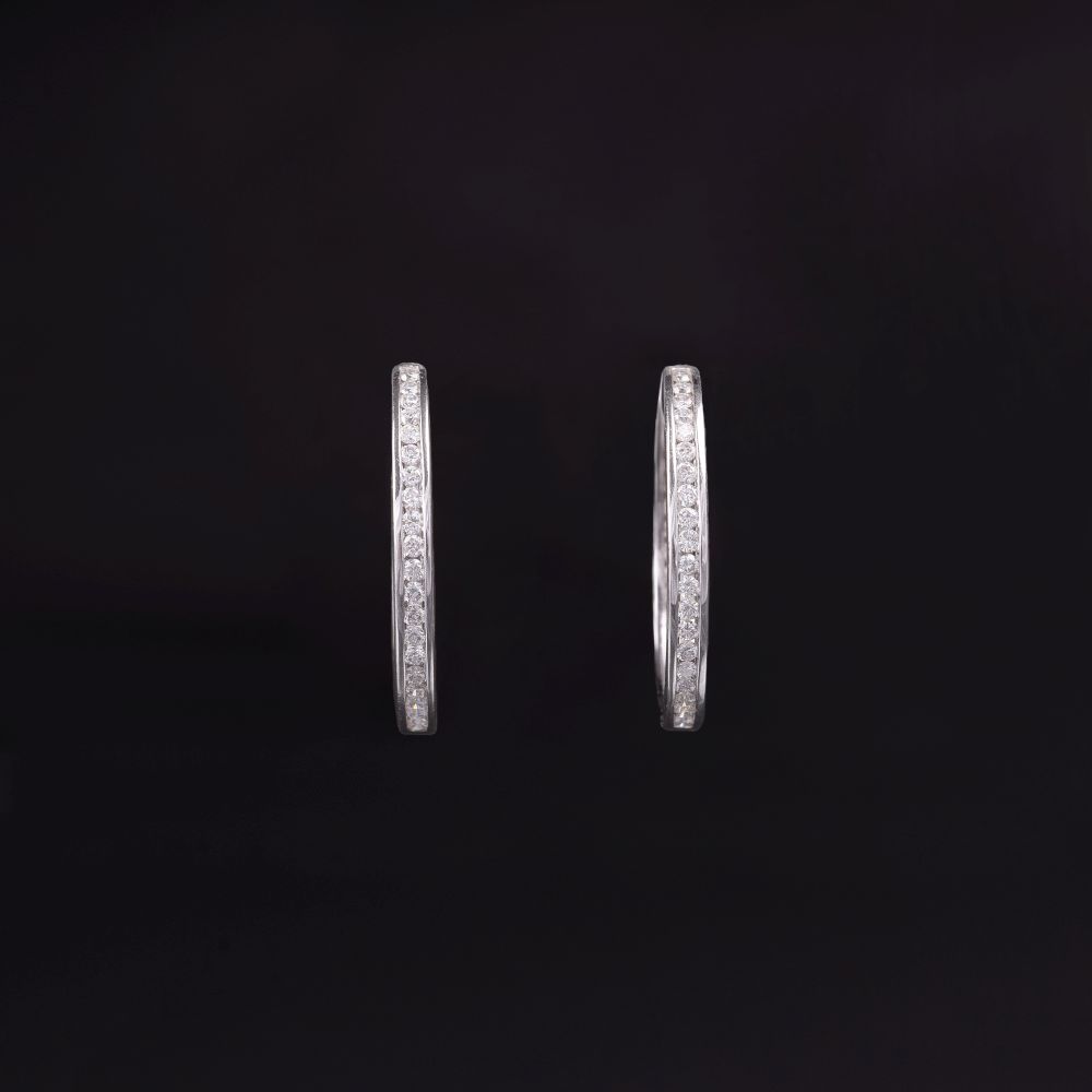 A Pair of Diamond Earrings - image 2