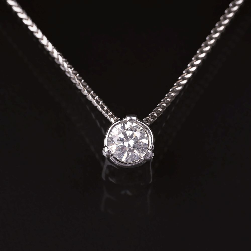 A Solitaire Diamond Pendant on Necklace A Solitaire Diamond Pendant on Necklace