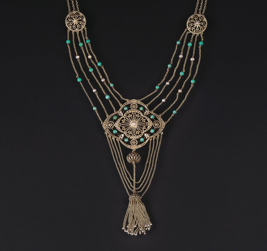 An Art Nouveau Necklace with Filigree Ornaments and Gemstones An Art Nouveau Necklace with Filigree Ornaments and Gemstones