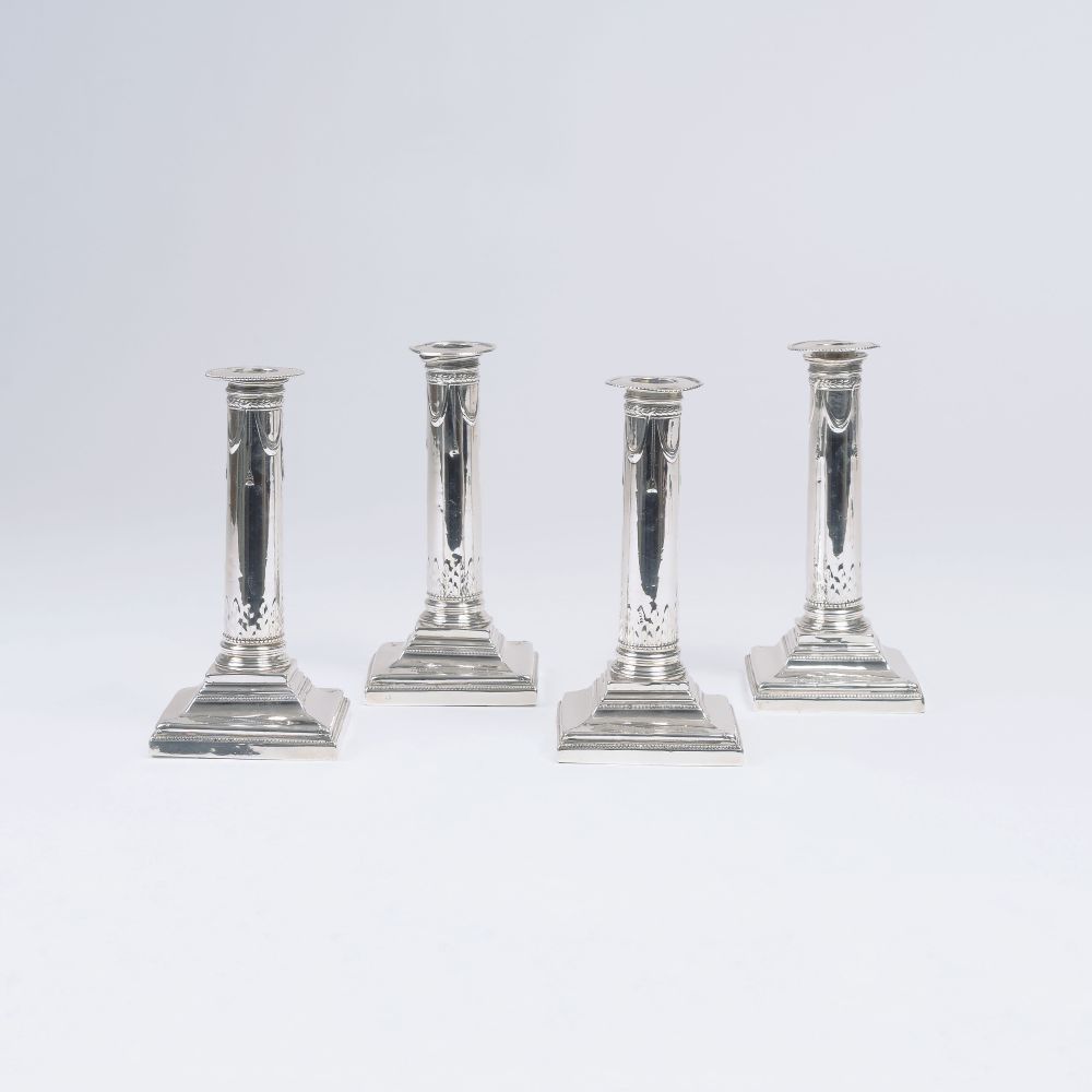 A Set of 4 George III Candle Holders