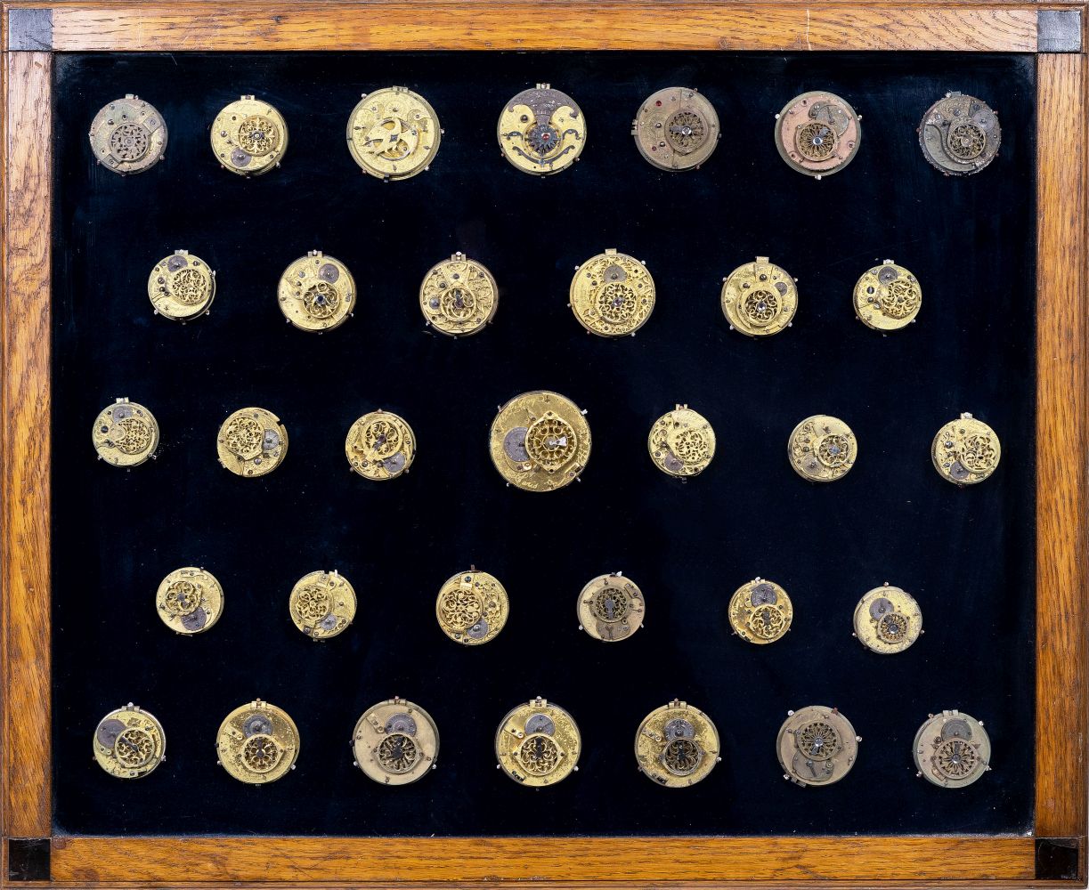 Three Glass Cabinets with antique Watch Movements and Watch Parts by English and French Masters